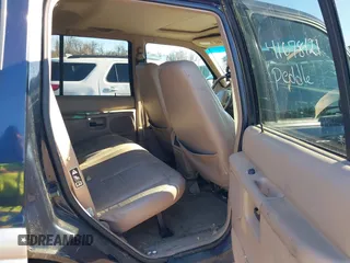 2000 Ford Explorer Eddie Bauer z VIN 1FMDU74E4YZA45773, wystawiony jako IAAI lot #41678121 z przebiegiem 129 263 mil mil oraz . Historia ofert i sprzedaży dostępna na DreamBid. Obrazek 8.