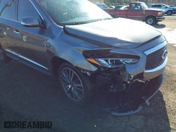 2016 Infiniti QX60 with VIN 5N1AL0MM5GC502404, listed as a IAAI auction lot 41347240 with 133,334 mi miles and . Bid and sale history available at DreamBid. Image 6.