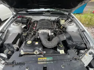 2006 Ford Mustang GT Deluxe z VIN 1ZVFT82H165131711, wystawiony jako Copart lot #80469435 z przebiegiem 154 783 mil mil oraz Czysty tytuł • Clean title. Historia ofert i sprzedaży dostępna na DreamBid. Obrazek 11.