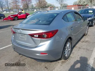 2014 Mazda 3 i Grand Touring with VIN JM1BM1W72E1196080, listed as a IAAI auction lot 42002800 with 88,772 mi miles. Bid and sale history available at carsss.com. Image 4.