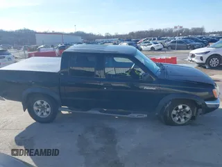 2000 Nissan Frontier XE z VIN 1N6ED27Y7YC341338, wystawiony jako IAAI lot #41486231 z przebiegiem 311 040 mil mil oraz . Historia ofert i sprzedaży dostępna na DreamBid. Obrazek 13.