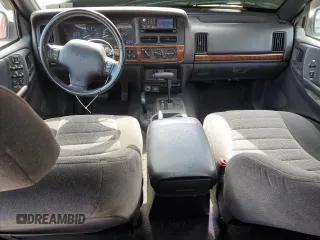 1997 Jeep Grand Cherokee Laredo with VIN 1J4GZ58S8VC601342, listed as a Copart auction lot 65360204 with 139,036 mi miles and Salvage Title. Bid and sale history available at carsss.com. Image 8.