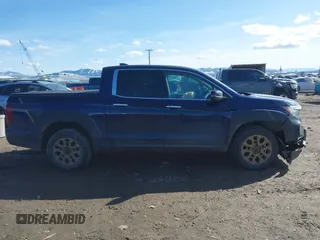 2022 Honda Ridgeline RTL-E with VIN 5FPYK3F71NB013522, listed as a IAAI auction lot 41670347 with 24,689 mi miles and . Bid and sale history available at DreamBid. Image 13.