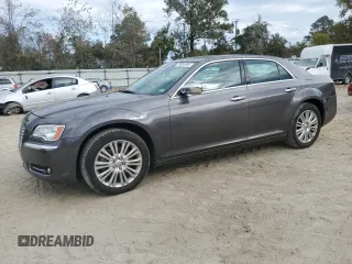 2014 Chrysler 300 C with VIN 2C3CCAKT6EH109281, listed as a Copart auction lot 79534984 with 183,148 mi miles and Salvage Title. Bid and sale history available at carsss.com. Image 1.