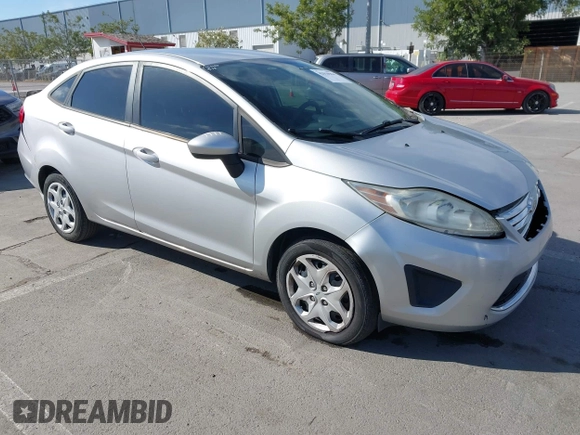 2012 Ford Fiesta SE with VIN 3FADP4BJ2CM150953, listed as a IAAI auction lot 42010904 with 77,637 mi miles. Bid and sale history available at carsss.com. Image 1.