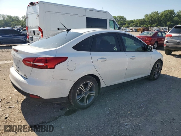 2017 Ford Focus SE with VIN 1FADP3FE8HL284169, listed as a Copart auction lot 61732695 with 70,443 mi miles and Salvage title. Bid and sale history available at DreamBid. Image 3.