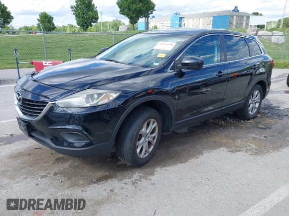 2014 Mazda CX-9 Touring with VIN JM3TB2CA9E0442202, listed as a IAAI auction lot 42292356 with 239,578 mi miles and . Bid and sale history available at DreamBid. Image 2.