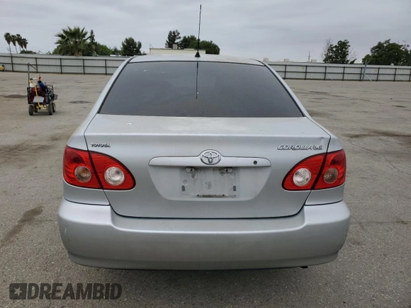 2005 Toyota Corolla CE with VIN 1NXBR32E05Z433886, listed as a Copart auction lot 53670115 with 169,213 mi miles and Salvage title. Bid and sale history available at DreamBid. Image 6.
