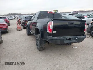 2018 Chevrolet Colorado 4WD ZR2 with VIN 1GCGTEENXJ1164617, listed as a IAAI auction lot 41354074 with 61,155 mi miles. Bid and sale history available at carsss.com. Image 3.
