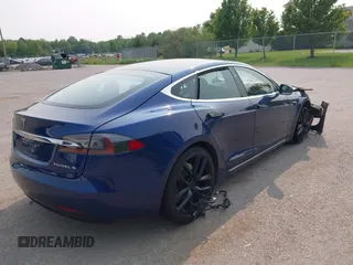 2017 Tesla Model S 100D with VIN 5YJSA1E27HF192505, listed as a IAAI auction lot 42409365 with 111,881 mi miles and . Bid and sale history available at DreamBid. Image 4.