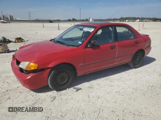 1999 Mazda Protege DX with VIN JM1BJ2225X0107748, listed as a Copart auction lot 48240945 with Not Provided miles and Clean Title. Bid and sale history available at DreamBid. Image 1.