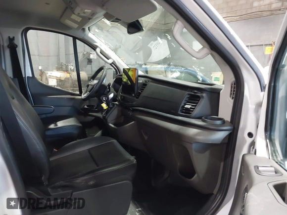 2024 Ford Transit Cargo with VIN 1FTBR2Y83RKA54611, listed as a IAAI auction lot 41349327 with 4,371 mi miles and . Bid and sale history available at DreamBid. Image 5.