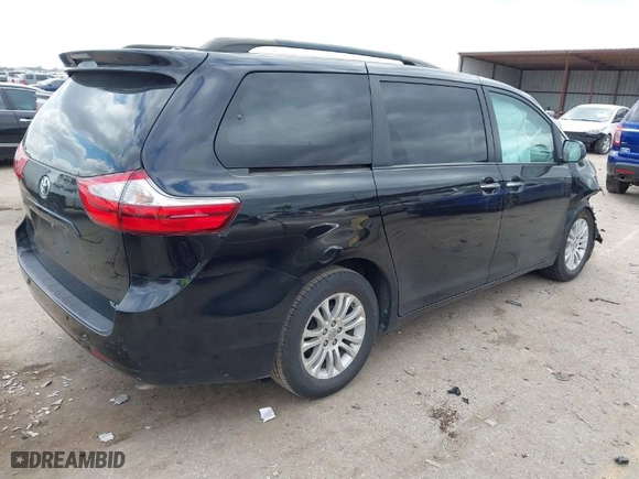 2016 Toyota Sienna XLE with VIN 5TDYK3DC6GS718551, listed as a IAAI auction lot 41537134 with 114,839 mi miles. Bid and sale history available at carsss.com. Image 4.