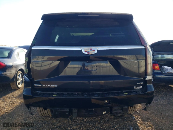 2024 Cadillac Escalade Premium Luxury with VIN 1GYS4BKL9RR232325, listed as a Copart auction lot 77145544 with 4,677 mi miles and Salvage Title. Bid and sale history available at carsss.com. Image 6.