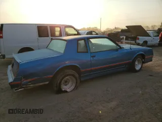 1984 Chevrolet Monte Carlo z VIN 1G1AZ37GXER137103, wystawiony jako Copart lot #74534514 z przebiegiem Nie podano mil oraz Tytuł czysty. Historia ofert i sprzedaży dostępna na DreamBid. Obrazek 3.