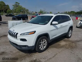 2015 Jeep Cherokee Latitude with VIN 1C4PJMCB4FW595084, listed as a IAAI auction lot 41880572 with 146,750 mi miles. Bid and sale history available at carsss.com. Image 17.