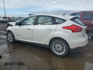 2016 Ford Focus Electric z VIN 1FADP3R41GL257400, wystawiony jako Copart lot #82003833 z przebiegiem 69 426 mil mil oraz . Historia ofert i sprzedaży dostępna na DreamBid. Obrazek 2.