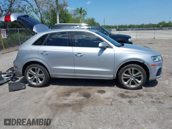 2017 Audi Q3 Premium Plus with VIN WA1HCCFS6HR003457, listed as a IAAI auction lot 42274572 with 54,546 mi miles and . Bid and sale history available at DreamBid. Image 14.