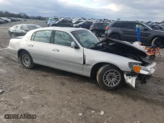 2002 Lincoln Town Car Cartier with VIN 1LNHM83W12Y612813, listed as a Copart auction lot 44310695 with 0 mi miles and Non Repairable. Bid and sale history available at carsss.com. Image 4.