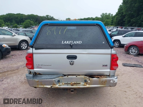 2005 Dodge Dakota SLT with VIN 1D7HW48N65S199887, listed as a IAAI auction lot 42508977 with 192,330 mi miles and . Bid and sale history available at DreamBid. Image 15.
