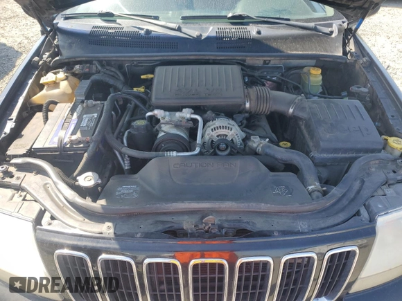 2002 Jeep Grand Cherokee Limited with VIN 1J8GW58NX2C158544, listed as a Copart auction lot 54937665 with 259,089 mi miles and Salvage title. Bid and sale history available at DreamBid. Image 12.