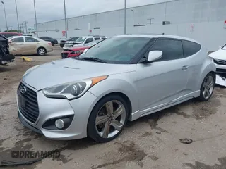 2013 Hyundai Veloster Turbo z VIN KMHTC6AE2DU122273, wystawiony jako IAAI lot #42174272 z przebiegiem 157 152 mil mil oraz . Historia ofert i sprzedaży dostępna na DreamBid. Obrazek 2.