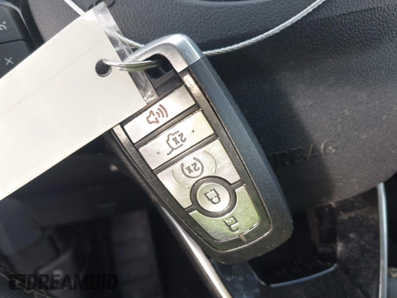 2021 Ford Escape Titanium Hybrid z VIN 1FMCU0DZ0MUB00944, wystawiony jako IAAI lot #41202146 z przebiegiem 52 458 mil mil oraz . Historia ofert i sprzedaży dostępna na DreamBid. Obrazek 11.