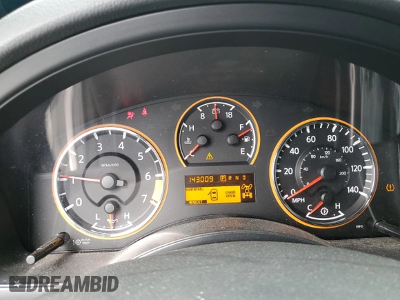 2012 Nissan Armada Platinum z VIN 5N1AA0NC4CN613049, wystawiony jako Copart lot #64414564 z przebiegiem 143 009 mil mil oraz Szkoda całkowita • Salvage title. Historia ofert i sprzedaży dostępna na DreamBid. Obrazek 9.