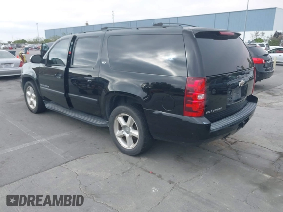 2008 Chevrolet Suburban LTZ z VIN 3GNFK16Y28G186226, wystawiony jako IAAI lot #42460005 z przebiegiem 218 041 mil mil oraz . Historia ofert i sprzedaży dostępna na DreamBid. Obrazek 3.
