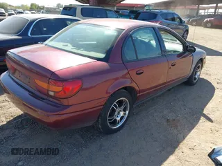 2002 Saturn SL with VIN 1G8ZK527X2Z276722, listed as a IAAI auction lot 42721685 with 126,462 mi miles and . Bid and sale history available at DreamBid. Image 4.