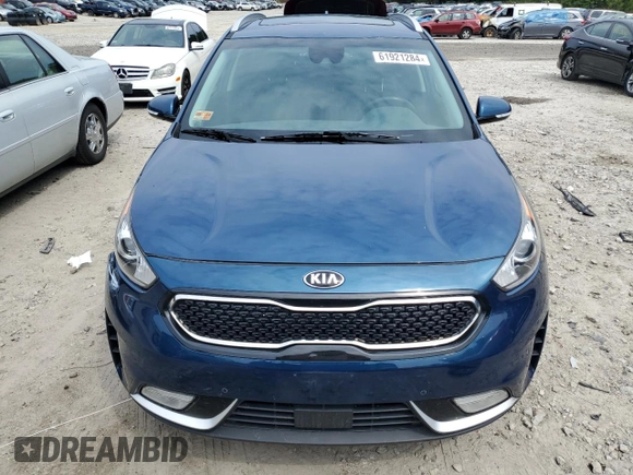 2019 Kia Niro Touring with VIN KNDCE3LCXK5345712, listed as a Copart auction lot 61921284 with 57,903 mi miles and Salvage Title. Bid and sale history available at carsss.com. Image 5.