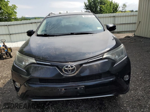 2016 Toyota RAV4 XLE with VIN 2T3RFREV6GW488911, listed as a Copart auction lot 60407195 with 110,517 mi miles and Salvage title. Bid and sale history available at DreamBid. Image 5.