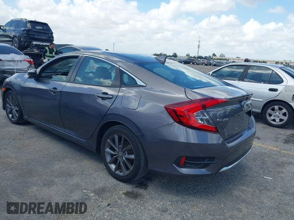 2021 Honda Civic Sedan EX with VIN 19XFC1F34ME001481, listed as a IAAI auction lot 41943440 with 35,851 mi miles. Bid and sale history available at carsss.com. Image 3.