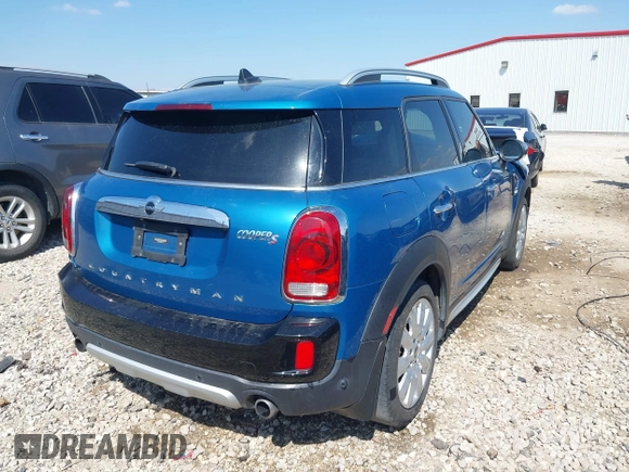2018 MINI Countryman Cooper S with VIN WMZYT5C30J3E60548, listed as a IAAI auction lot 41890016 with 75,769 mi miles and . Bid and sale history available at DreamBid. Image 4.