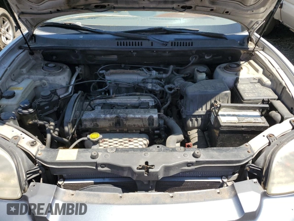2004 Hyundai Santa Fe z VIN KM8SB12B14U711904, wystawiony jako Copart lot #58957365 z przebiegiem 214 051 mil mil oraz Szkoda całkowita • Salvage title. Historia ofert i sprzedaży dostępna na DreamBid. Obrazek 12.