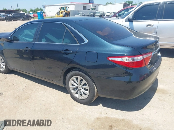 2016 Toyota Camry XLE with VIN 4T4BF1FK3GR535768, listed as a IAAI auction lot 41988698 with 157,452 mi miles. Bid and sale history available at carsss.com. Image 3.