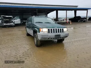 1997 Jeep Grand Cherokee TSi with VIN 1J4FX58S6VC602782, listed as a Copart auction lot 86605074 with 158,971 mi miles and Salvage Title. Bid and sale history available at carsss.com. Image 12.