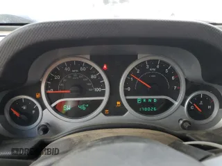 2010 Jeep Wrangler Unlimited Sahara with VIN 1J4HA5H13AL182071, listed as a Copart auction lot 51696665 with 178,026 mi miles and Salvage Title. Bid and sale history available at carsss.com. Image 9.