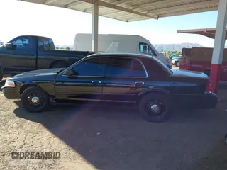 2007 Ford Police Interceptor with VIN 2FAFP71W27X115458, listed as a IAAI auction lot 42566334 with 213,435 mi miles and . Bid and sale history available at DreamBid. Image 14.