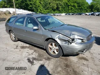 2004 Ford Taurus SE with VIN 1FAFP58S44A108250, listed as a Copart auction lot 58520615 with 119,575 mi miles and Salvage title. Bid and sale history available at DreamBid. Image 4.