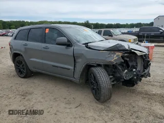 2021 Jeep Grand Cherokee Laredo E with VIN 1C4RJEAG9MC657803, listed as a Copart auction lot 55797185 with 79,357 mi miles and Salvage title. Bid and sale history available at DreamBid. Image 4.