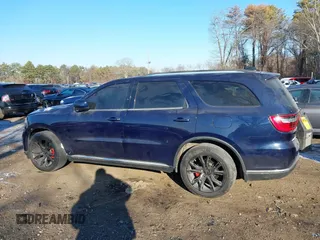 2014 Dodge Durango SXT with VIN 1C4RDHAG5EC369951, listed as a IAAI auction lot 41278358 with 214,453 mi miles and . Bid and sale history available at carsss.com. Image 14.