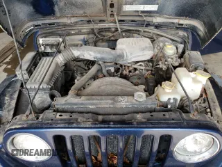 2000 Jeep Wrangler SE with VIN 1J4FA29P1YP739555, listed as a Copart auction lot 58501025 with 128,458 mi miles and Clean title. Bid and sale history available at DreamBid. Image 11.
