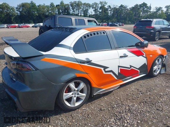 2014 Mitsubishi Lancer GT with VIN JA32U8FW6EU015415, listed as a IAAI auction lot 40171318 with 40,000 mi miles. Bid and sale history available at carsss.com. Image 4.