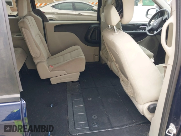2015 Dodge Grand Caravan American Value with VIN 2C4RDGBG2FR615100, listed as a IAAI auction lot 42002131 with 178,507 mi miles and . Bid and sale history available at DreamBid. Image 8.