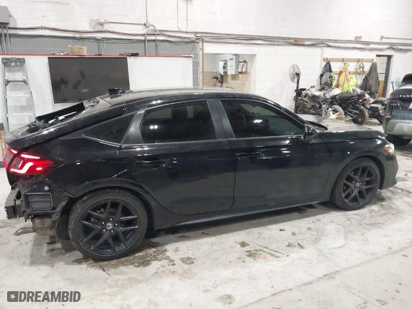 2023 Honda Civic Hatchback Sport with VIN 19XFL2H85PE007244, listed as a IAAI auction lot 41572024 with 21,182 mi miles. Bid and sale history available at carsss.com. Image 13.