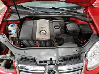 2009 Volkswagen Jetta z VIN 3VWTZ71K09M257775, wystawiony jako Copart lot #83597844 z przebiegiem 152 451 mil mil oraz Czysty tytuł • Clean title. Historia ofert i sprzedaży dostępna na DreamBid. Obrazek 11.