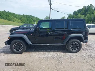 2017 Jeep Wrangler Unlimited Rubicon Recon z VIN 1C4HJWFG4HL507601, wystawiony jako IAAI lot #42258921 z przebiegiem 106 122 mil mil oraz . Historia ofert i sprzedaży dostępna na DreamBid. Obrazek 15.
