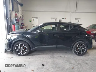 2020 Toyota C-HR LE with VIN JTNKHMBX1L1077957, listed as a IAAI auction lot 42159765 with 83,138 mi miles and . Bid and sale history available at DreamBid. Image 15.