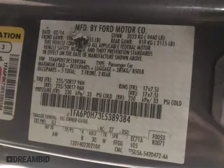 2014 Ford Fusion SE with VIN 1FA6P0H73E5389384, listed as a IAAI auction lot 41387809 with 164,490 mi miles. Bid and sale history available at carsss.com. Image 9.